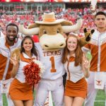 texas-longhorns-mascot-hook-'em-poses-cheerleaders-440nw-14161045co